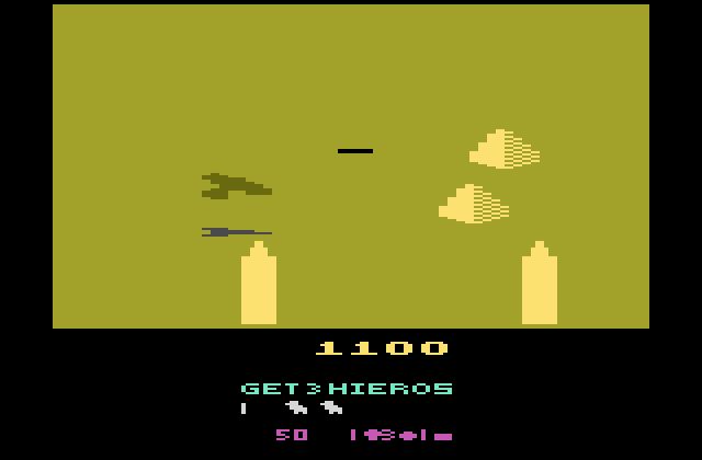 Desert Falcon Atari 2600 Screenshot: Flying around some obstacles...