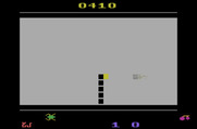 Tape Worm for Atari 2600 - Use the joystick button or collect a bean to temporarily light up the screen.