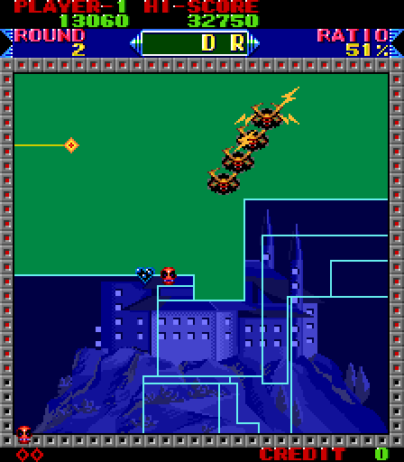 Super Qix Arcade Screenshot: The game can get trickier as the board gets filled.