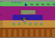 Tapper for Atari 2600 - This guy shakes up the cans; can you find the one that hasn't been shaken?