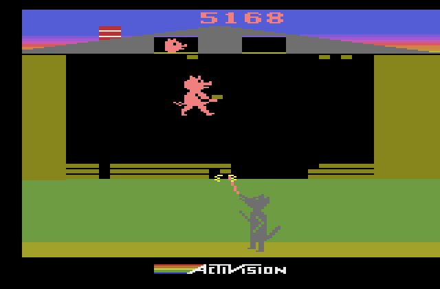 Oink! Atari 2600 Screenshot: Try to fill in the gaps as fast as the wolf creates them!