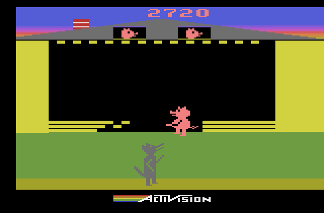 Oink! Atari 2600 Screenshot: This pig in the house of straw has been caught!