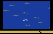 Swordquest: WaterWorld for Atari 2600 - Swimming with sharks.