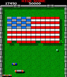 Tournament Arkanoid for Arcade - The "E" capsule provides an expanded size paddle.