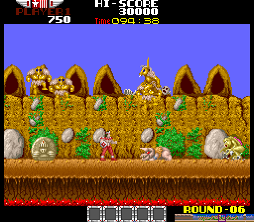 Rygar Arcade Screenshot: Opponents crawl out of those huts to attack you!