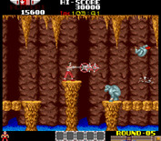 Rygar for Arcade - This cave has more gaps you need to avoid falling into.