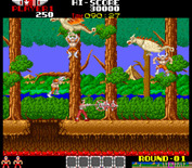 Rygar for Arcade - Be sure to jump over the gaps in the path.