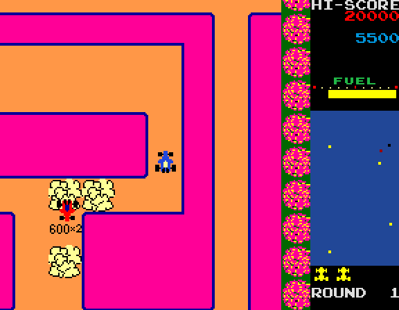 New Rally-X Arcade Screenshot: Use the smoke screen to temporarily block the red cars.