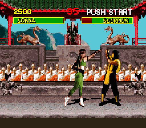 Mortal Kombat Super NES Screenshot: Scorpion blocks Sonya's punch...