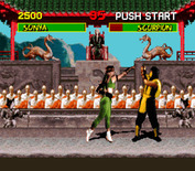 Mortal Kombat for Super NES - Scorpion blocks Sonya's punch...