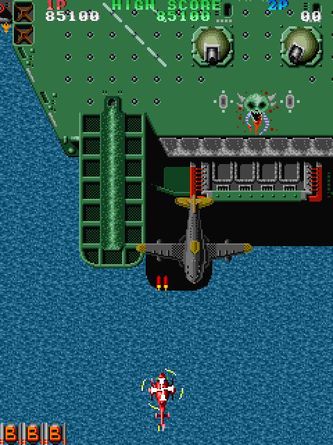 Twin Cobra Arcade Screenshot: The larger planes take multiple shots to destroy.