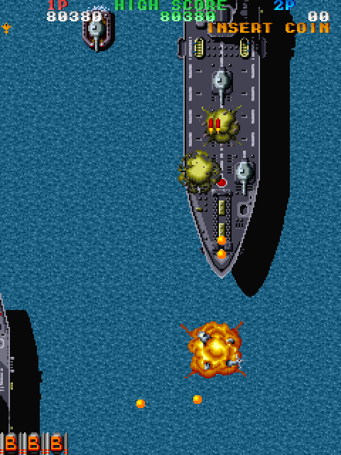 Twin Cobra Arcade Screenshot: Shot down by a large vessel...