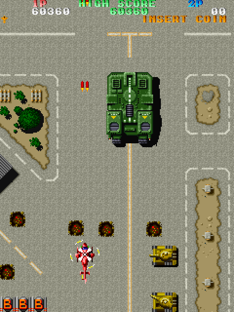 Twin Cobra Arcade Screenshot: Fighting a large tank at the end of the level.