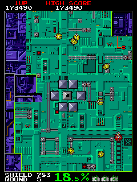 Volfied Arcade Screenshot: If you can enclose those grey blocks a bonus is awarded.