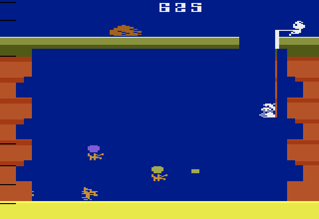 Pooyan Atari 2600 Screenshot: Don't let the wolves float up and push the rock over on this round!