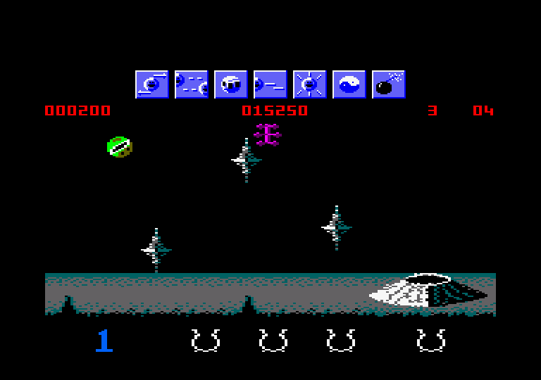 Wizball Amstrad CPC Screenshot: Shoot the purple thing before you bounce over that way...