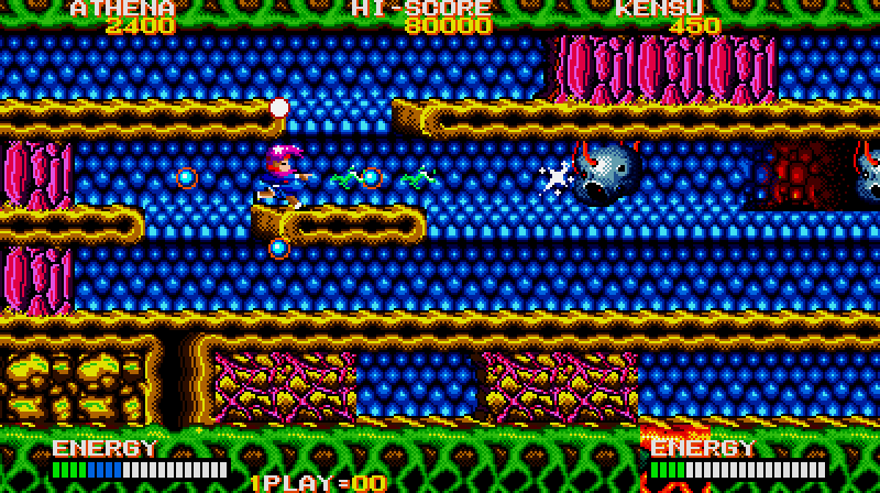 Psycho Soldier Arcade Screenshot: Those things on the ceiling shoot at you, so better to shoot them first...
