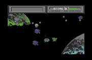 Blasteroids for Commodore 64 - Don't crash into the incoming saucer.