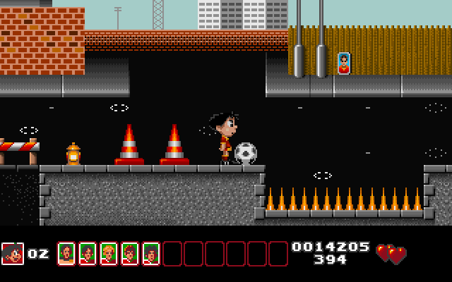 Soccer Kid IBM PC/Compatibles Screenshot: Time your jump carefully, landing on spikes is dangerous!