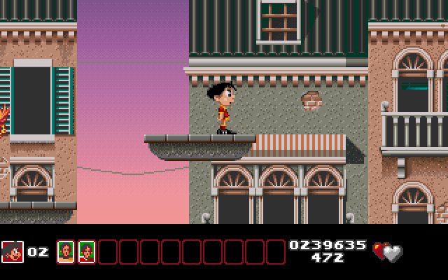 Soccer Kid IBM PC/Compatibles Screenshot: Jumping along more platforms...