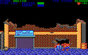 Trojan for IBM PC/Compatibles - The first end of level boss breaks through that wall...