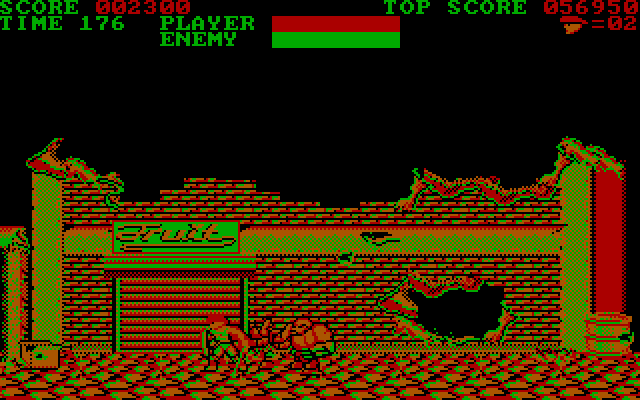 Trojan IBM PC/Compatibles Screenshot: The first stage boss breaks through the wall...