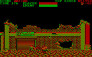 Trojan for IBM PC/Compatibles - The first stage boss breaks through the wall...