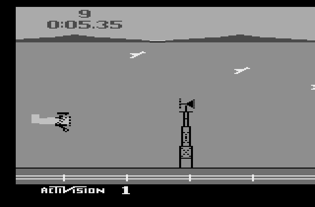 Barnstorming Atari 2600 Screenshot: Avoid obstacles, such as these windmills...