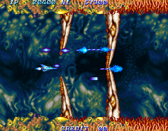 Salamander 2 Arcade Screenshot: Another area where you need to dodge moving obstacles.