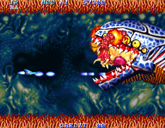 Salamander 2 Arcade Screenshot: Attacking the first end of level boss.