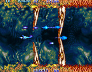 Salamander 2 for Arcade - Another area where you need to dodge moving obstacles.
