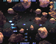 Salamander 2 for Arcade - A large wave of asteroids approaches.