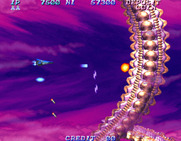 Salamander 2 for Arcade - Just avoid these giant snakes, you can't destroy them...