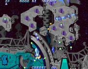 Salamander 2 for Arcade - Stages alternate between horizontal and vertical scrolling.