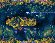 Salamander 2 for Arcade - Firing lasers, one of the more powerful weapons available...