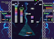 Arkanoid Returns for Arcade - Each paddle is controlled by a different player.