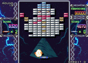 Arkanoid Returns for Arcade - A paddle explodes when the ball falls off of the bottom of the screen.