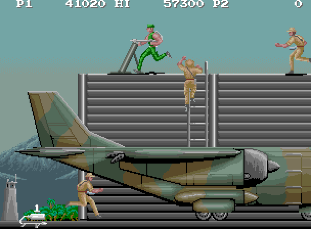 M.I.A.: Missing in Action Arcade Screenshot: A flame thrower is on the ground, hurry pick it up!