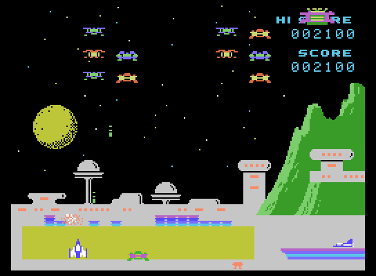 Spectron ColecoVision Screenshot: Don't get hit by invaders along the bottom of the screen...