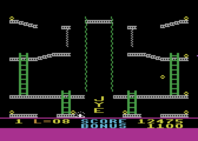 Jumpman Junior Atari 8-bit Screenshot: Mysterious letters appear on the spellbound level...