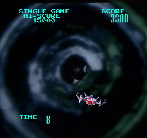 Astron Belt Arcade Screenshot: Blast enemies at the end of this tunnel...