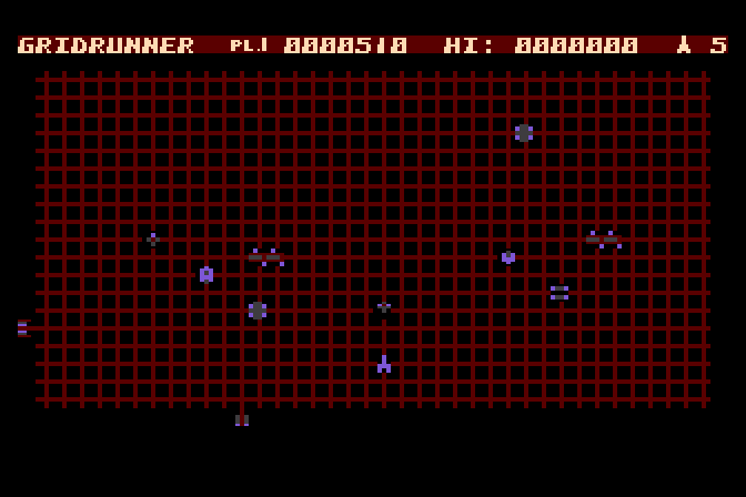 Gridrunner Atari 8-bit Screenshot: Blasting opponents as more obstacles appear on the grid...