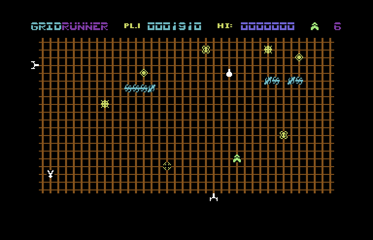 Gridrunner Commodore 64 Screenshot: Shoot those light blue opponents to complete the level...