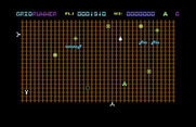 Gridrunner for Commodore 64 - Shoot those light blue opponents to complete the level...