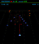 Juno First for Arcade - Shooting an invader formation...