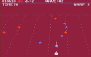 Juno First for IBM PC/Compatibles - The screen flashes grey and then red when you are earning bonus points for each enemy shot...