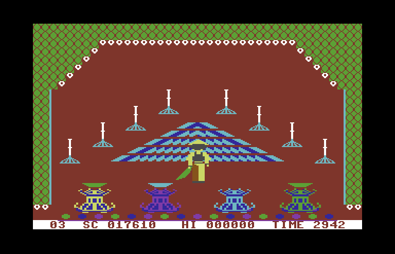 Chinese Juggler Commodore 64 Screenshot: Grabbed a green plate to start juggling...