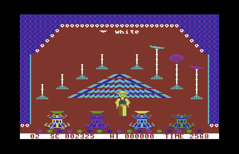 Chinese Juggler Commodore 64 Screenshot: The next place I need to place needs to be white...but there aren't any.