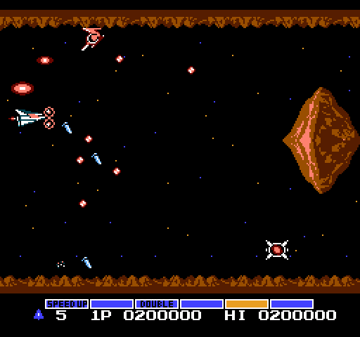 Gradius NES / Famicom Screenshot: Don't crash into the walls or that rock floating in the middle of the screen...