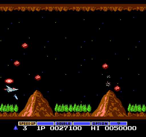 Gradius NES / Famicom Screenshot: These two volcanoes shoot out rocks rapidly!